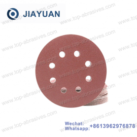 red sandpaper with 8 holes